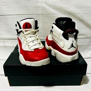 Kids size 12 Jordan red, black & white boots